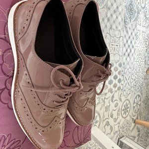 Cole Haan Grand os Oxford Shoe 
Small pink mark on tip of left shoe